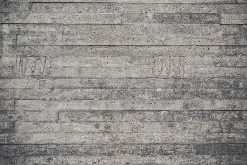 Eine graue Holzwand