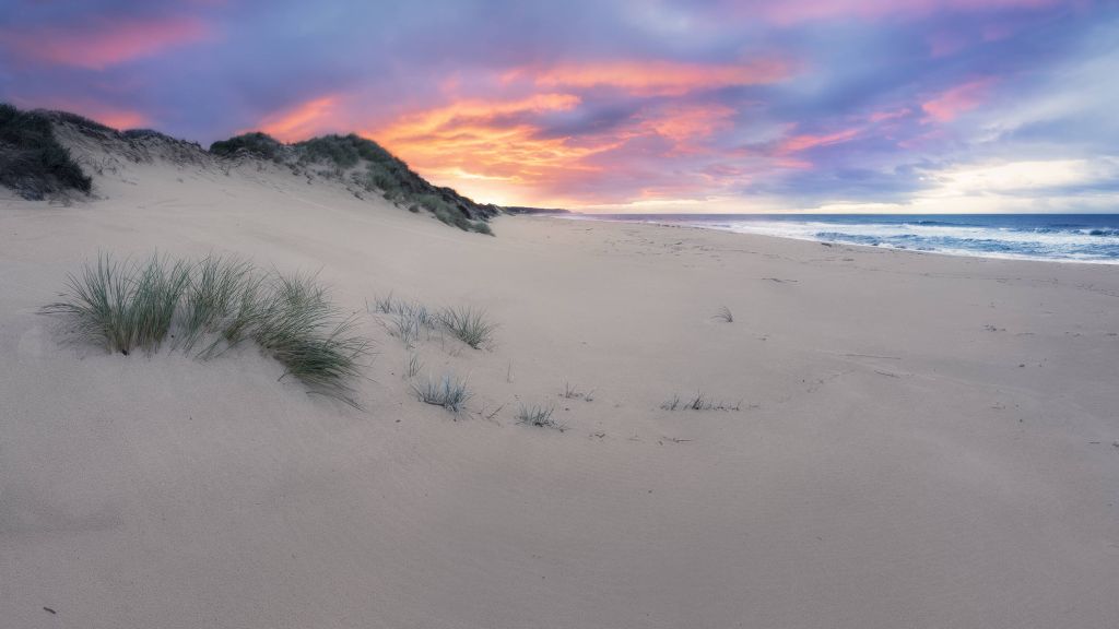Sonnenaufgang über Sanddünen