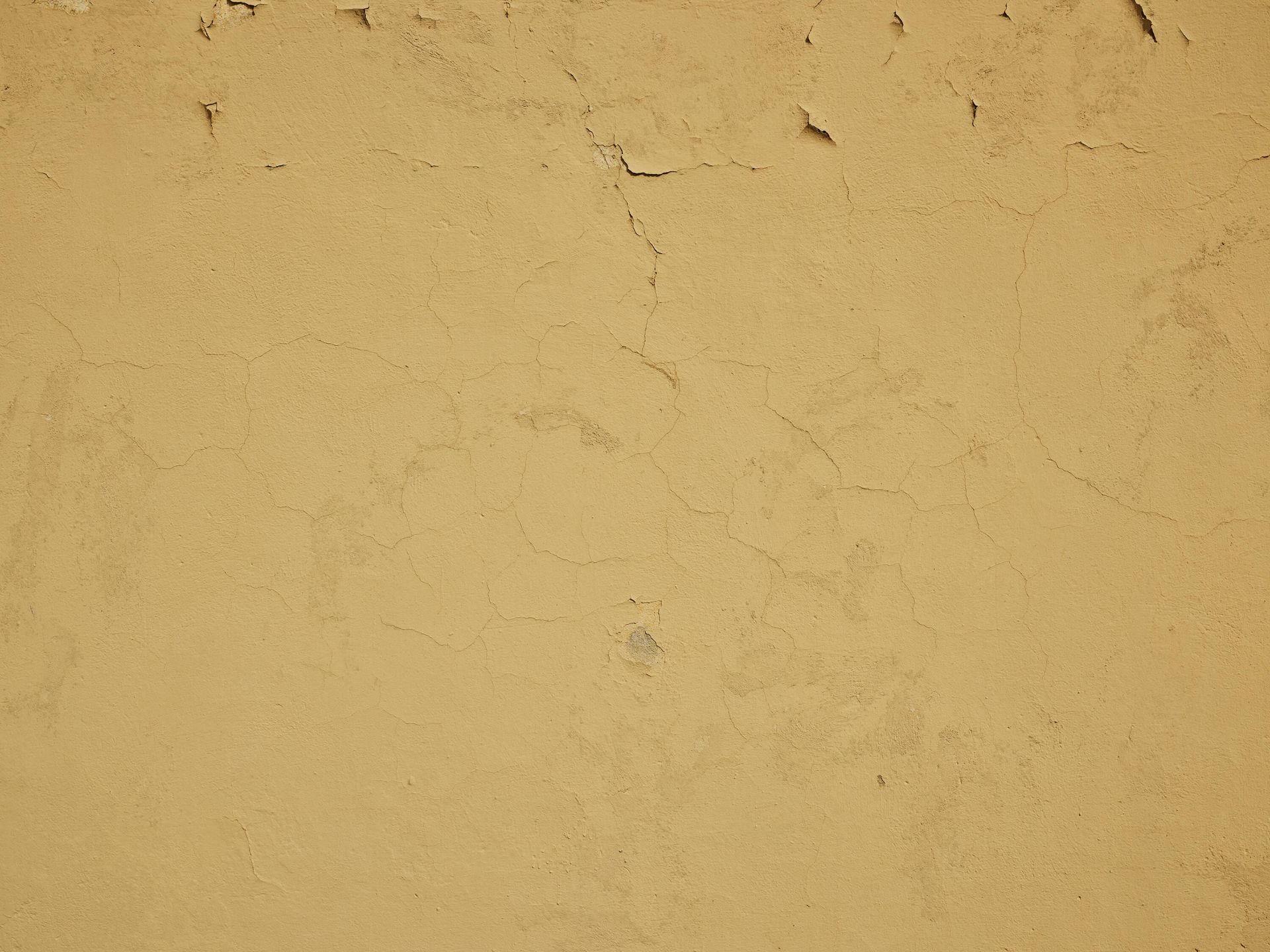 Wand mit gerissener Farbe