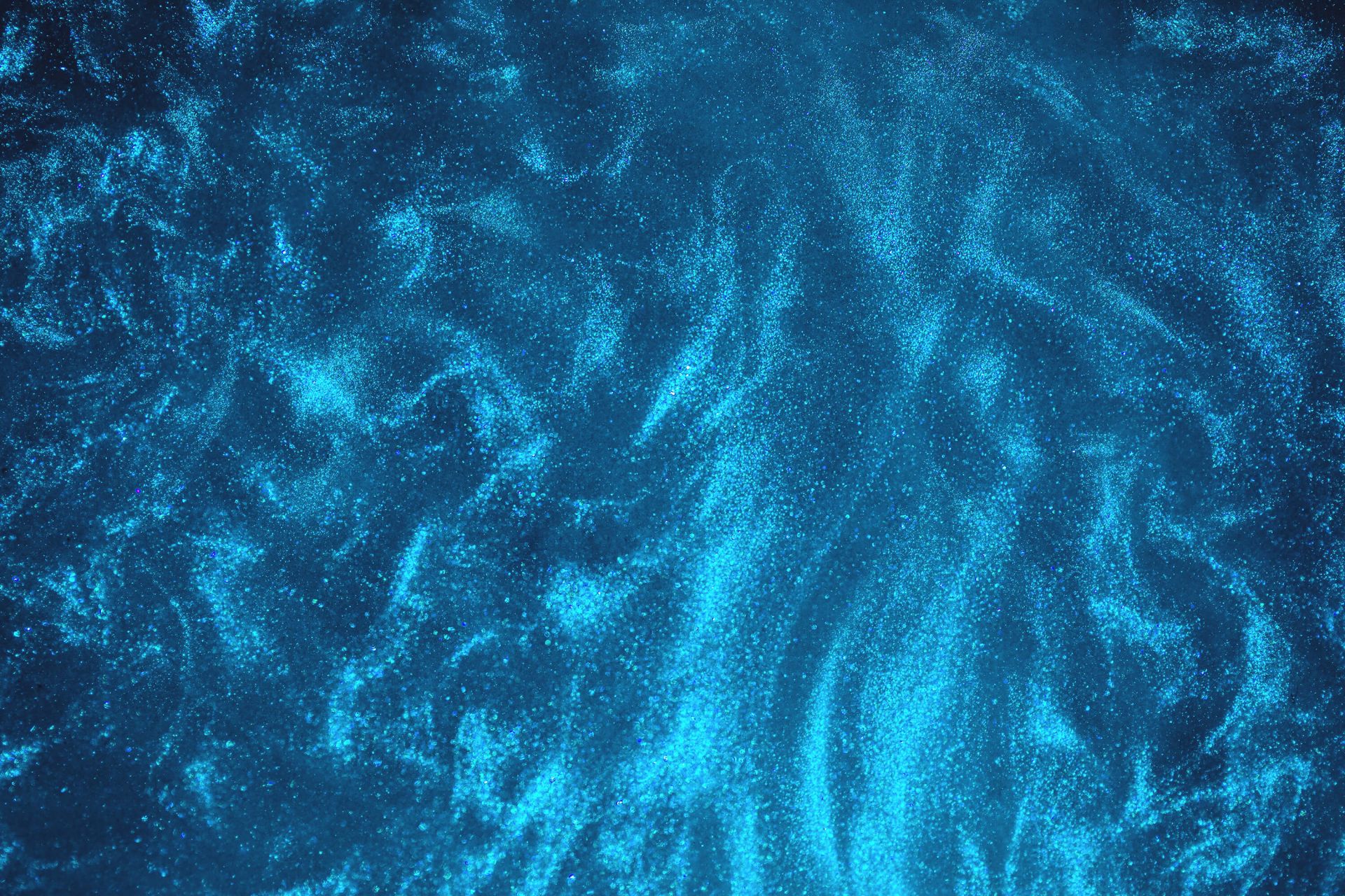 Blauer Glitzerstrahl