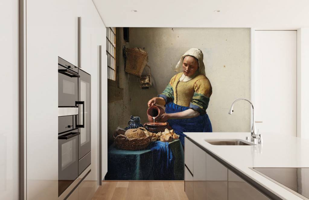 Das Milchmädchen von Johannes Vermeer als Fototapete in der Küche. 